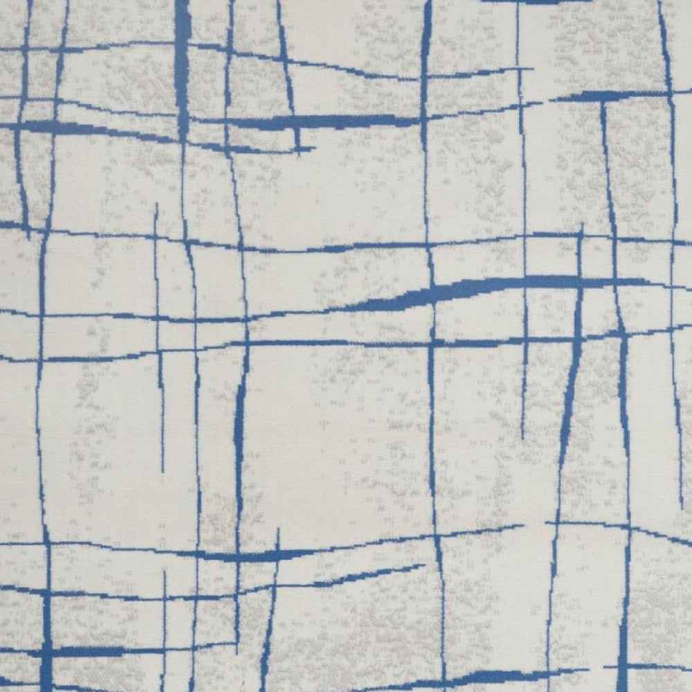 4' X 6' Blue And Ivory Abstract Dhurrie Area Rug