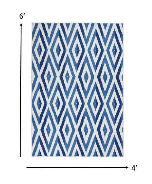 4' X 6' Blue And Ivory Geometric Dhurrie Area Rug