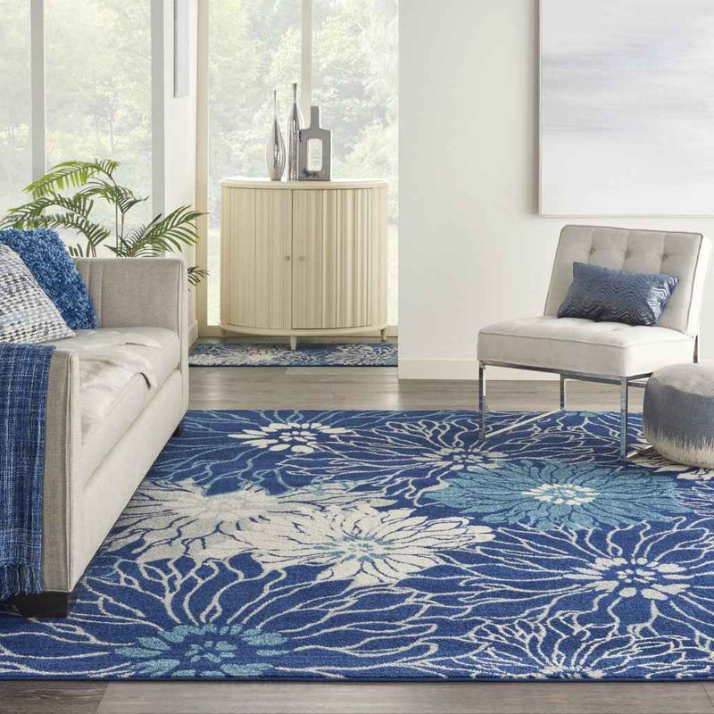 7' X 10' Blue And Ivory Floral Power Loom Area Rug
