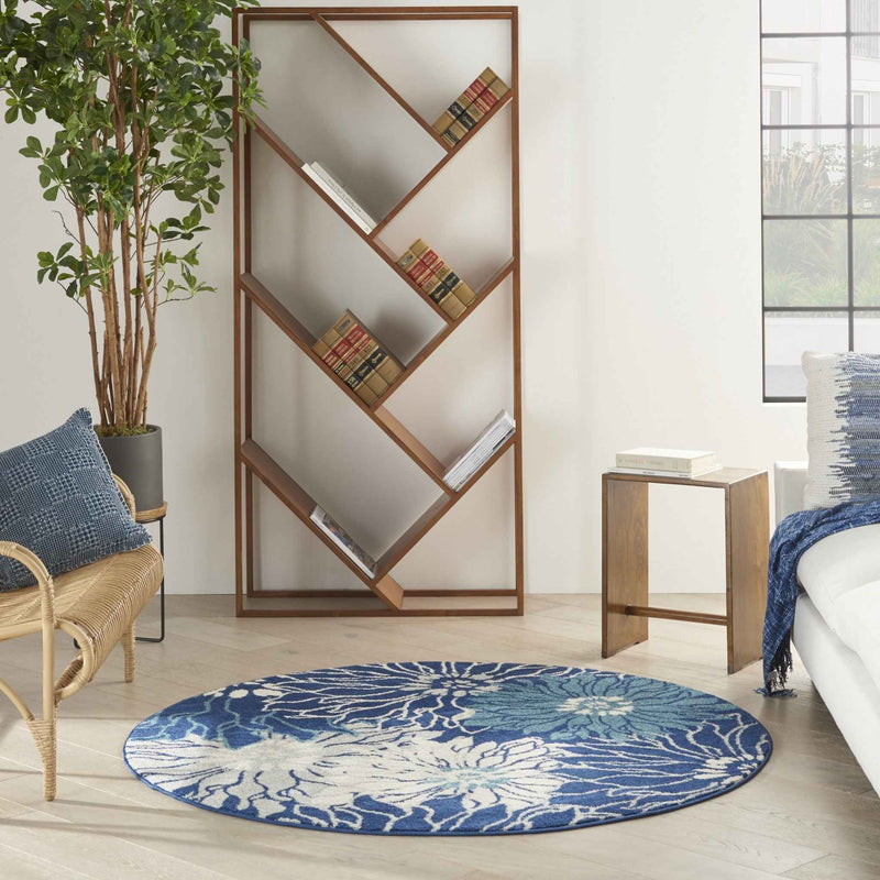 5' Blue And Ivory Round Floral Dhurrie Area Rug