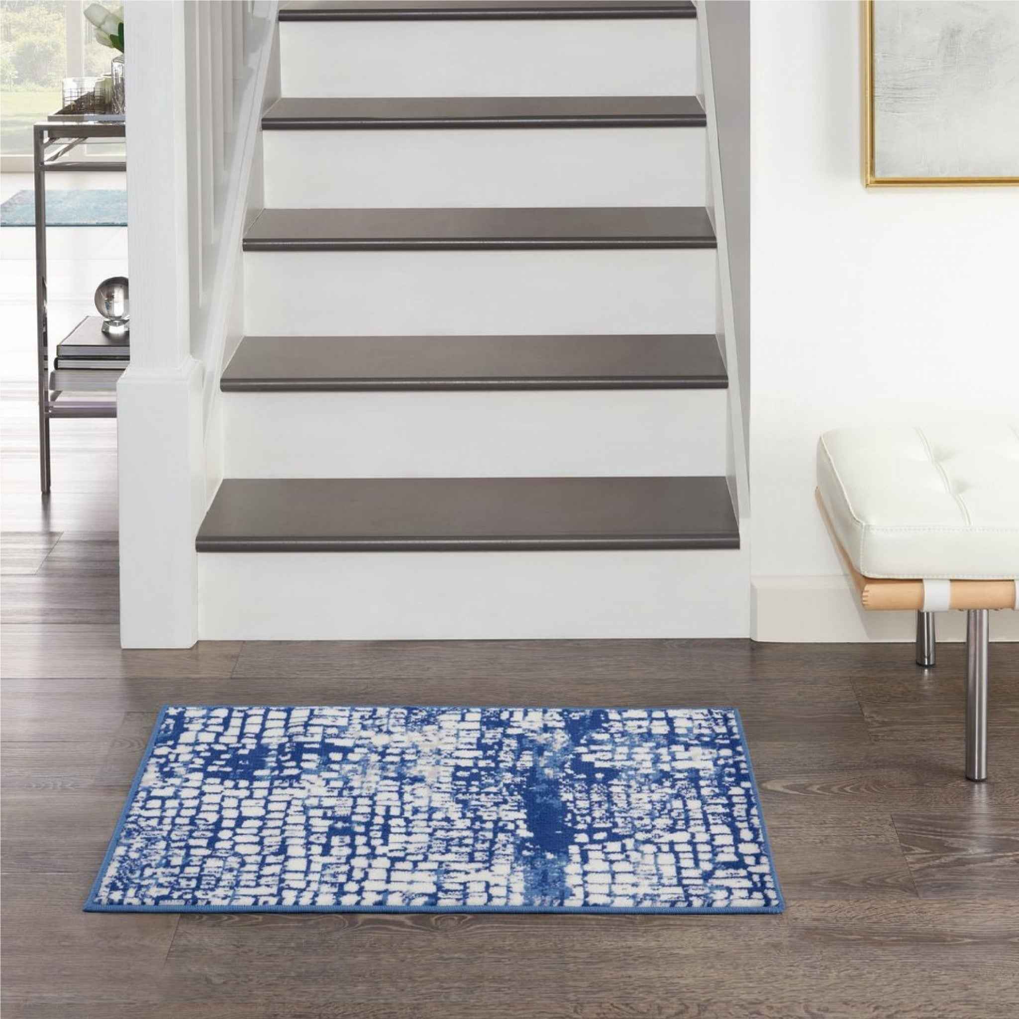 6' X 9' Blue And Ivory Abstract Dhurrie Area Rug