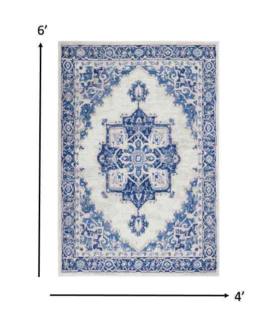 4' X 6' Blue And Ivory Floral Dhurrie Area Rug