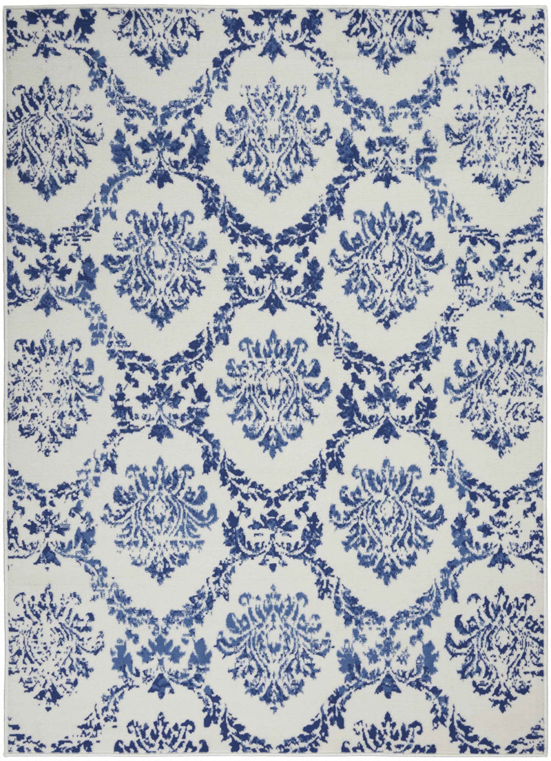 5' X 7' Blue And Ivory Floral Dhurrie Area Rug