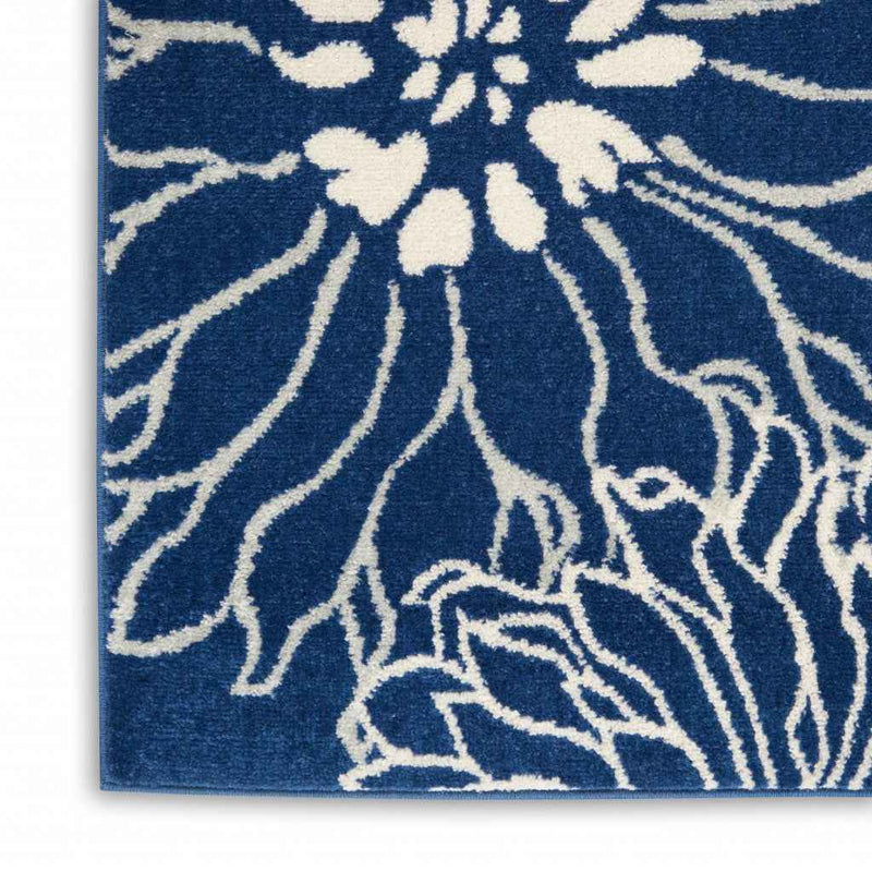 8' X 10' Blue And Ivory Floral Power Loom Area Rug