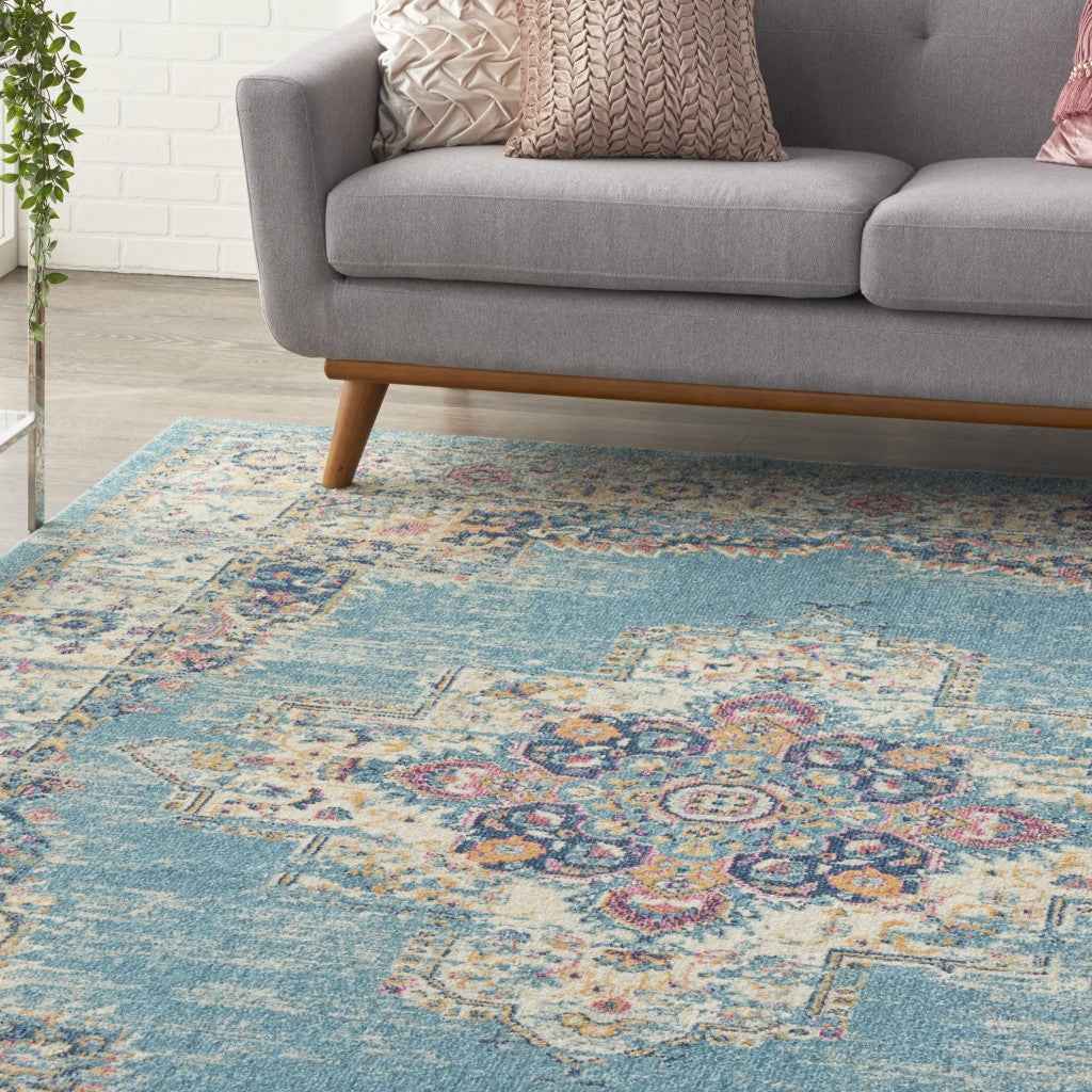 7' x 10' Blue and Ivory Medallion Power Loom Distressed Area Rug