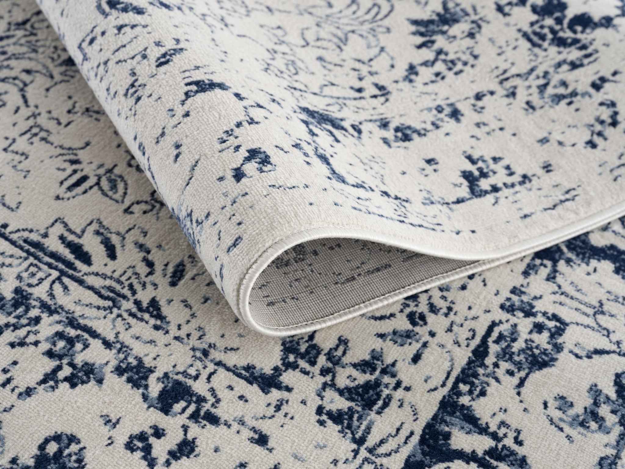 5’ X 8’ Navy Blue Distressed Floral Area Rug