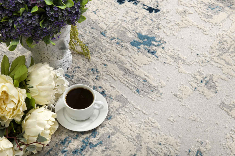 5’ X 8’ Blue And Ivory Abstract Strokes Area Rug