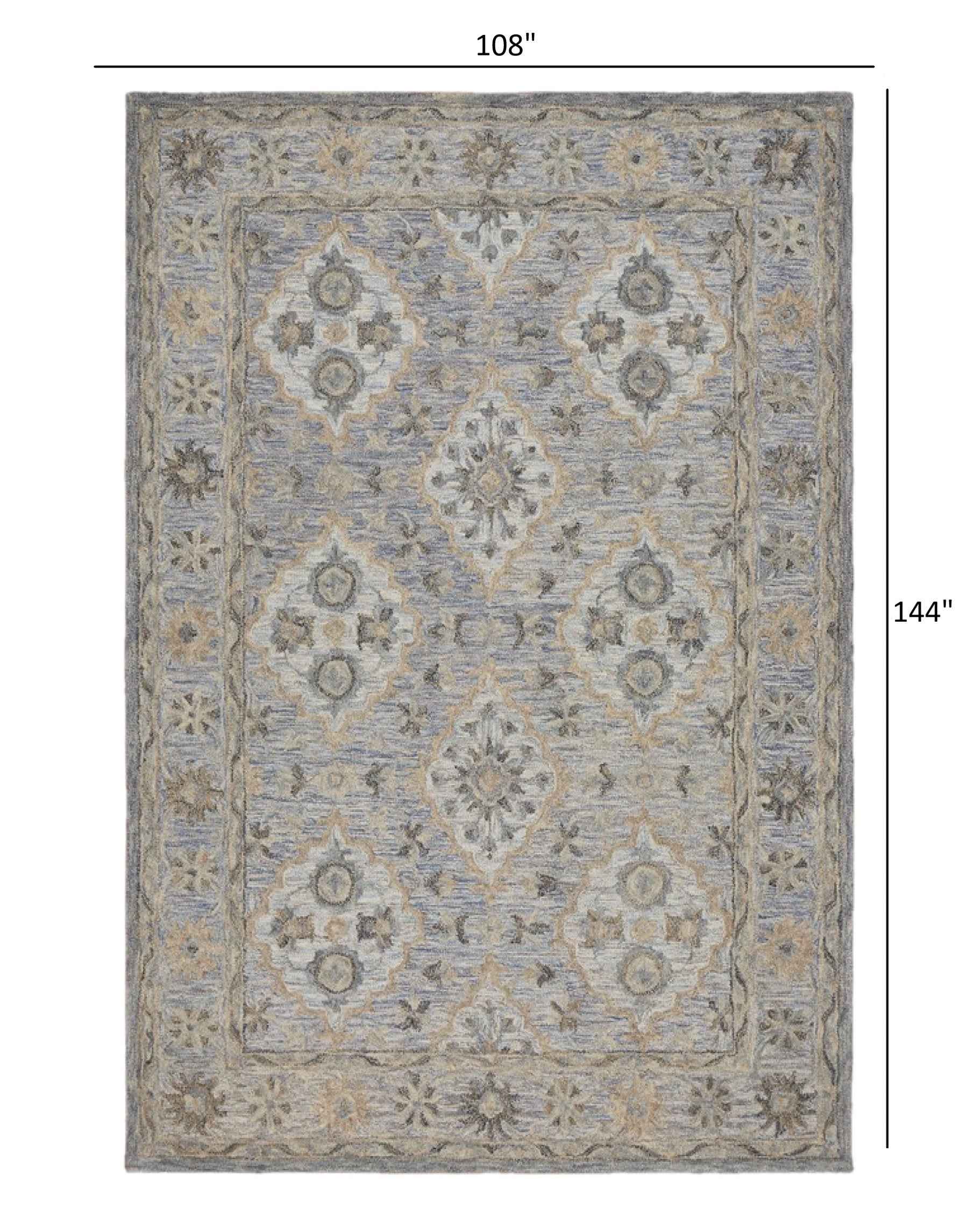 9’ x 12’ Blue and Tan Traditional Area Rug