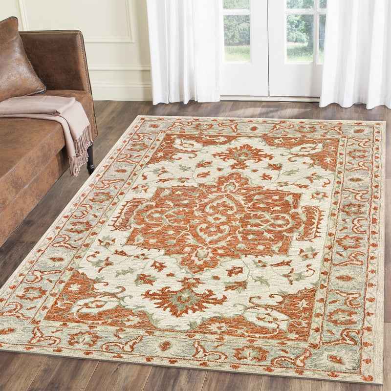 9’ x 12’ Orange and Ivory Medallion Area Rug