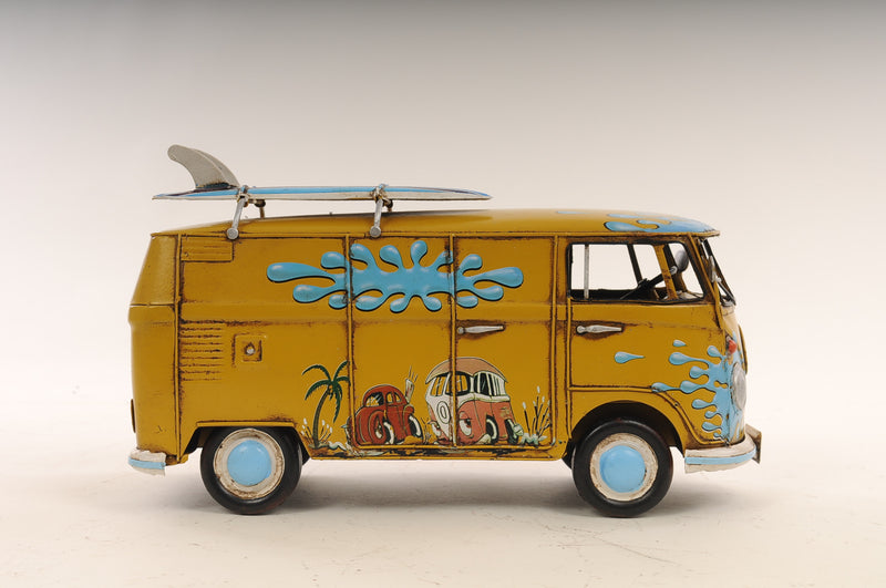 Yellow hand-painted metal Volkswagen-style model van with blue trim and side art.