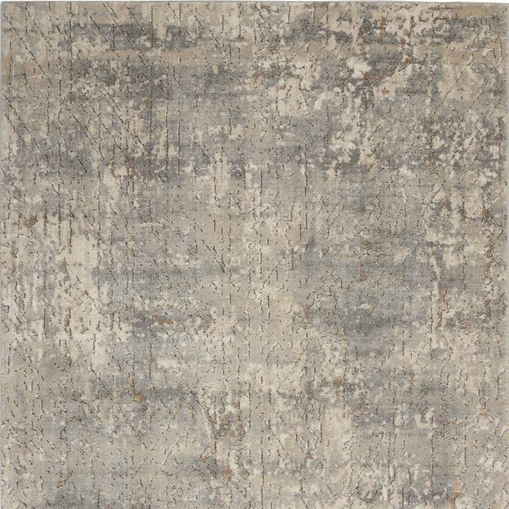 5' X 7' Beige And Grey Abstract Power Loom Non Skid Area Rug