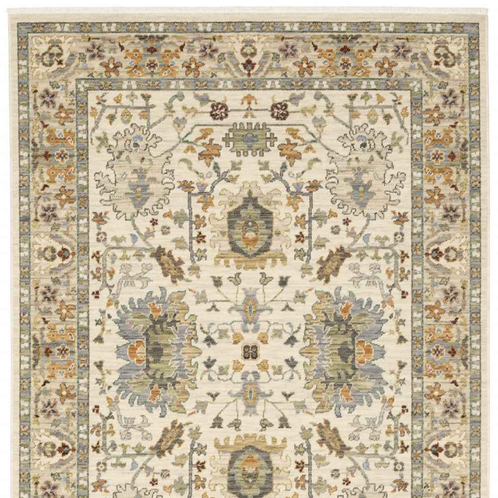 10' X 13' Ivory Oriental Power Loom Stain Resistant Area Rug With Fringe