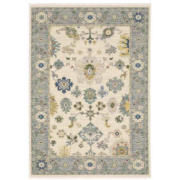 2' X 6' Ivory Blue Grey Teal Gold Green And Rust Oriental Power Loom Stain Resistant Runner Rug With Fringe