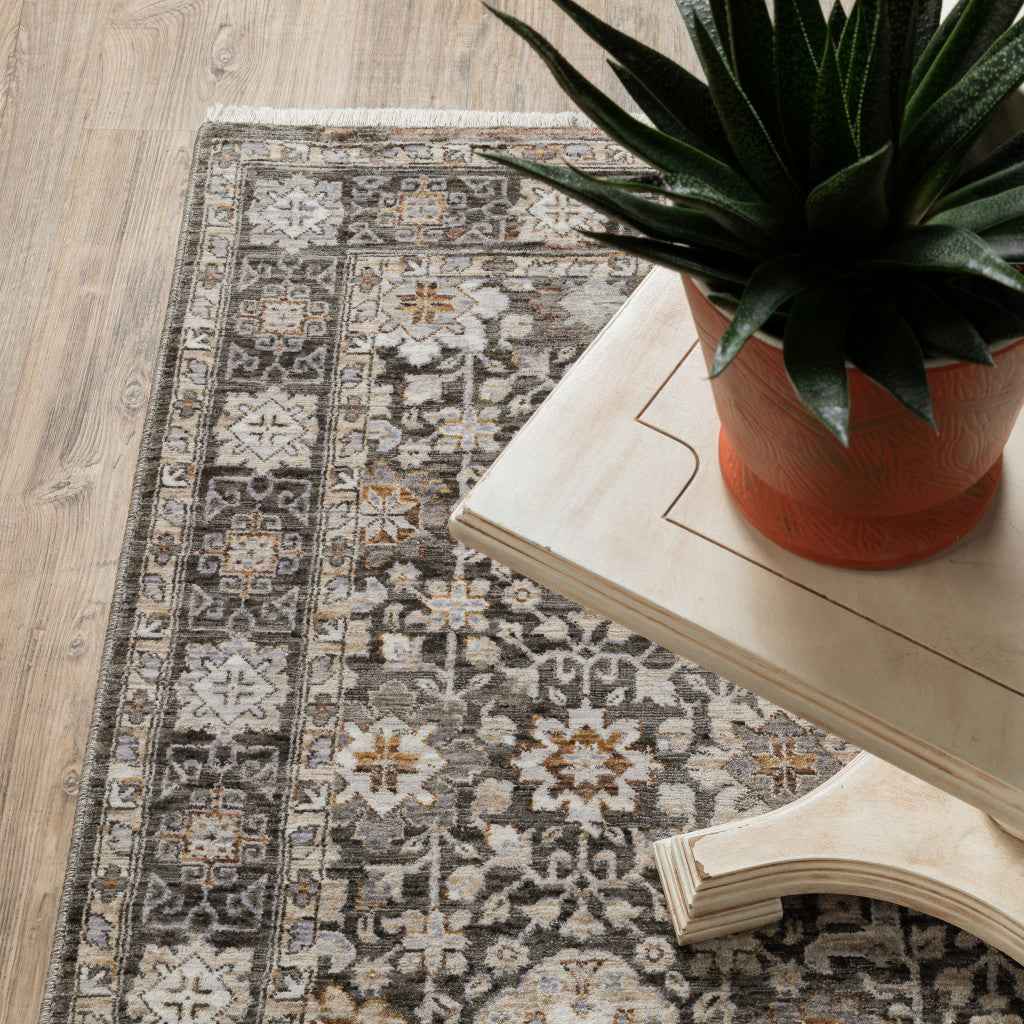 8' X 11' Grey And Ivory Oriental Power Loom Stain Resistant Area Rug With Fringe