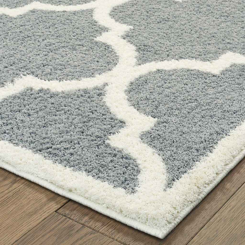 6' X 9' Grey And Ivory Geometric Shag Power Loom Stain Resistant Area Rug