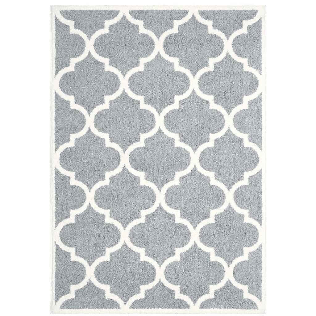 6' X 9' Grey And Ivory Geometric Shag Power Loom Stain Resistant Area Rug