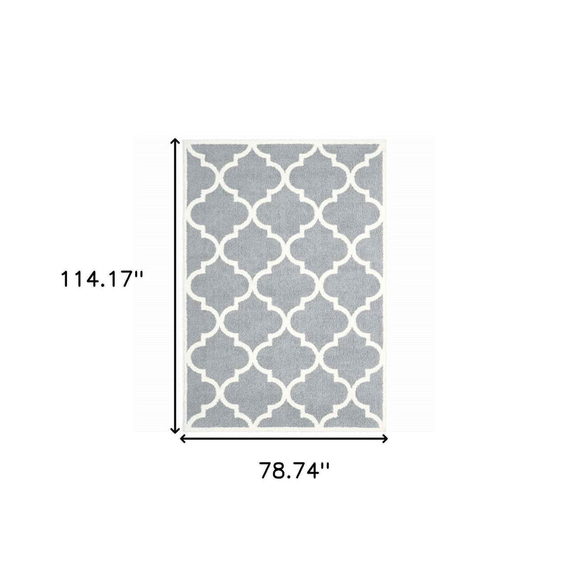 6' X 9' Grey And Ivory Geometric Shag Power Loom Stain Resistant Area Rug