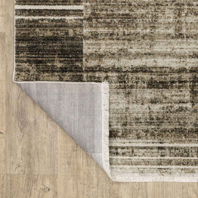 5' X 8' Beige Charcoal Brown Grey Tan Gold And Blue Geometric Power Loom Stain Resistant Area Rug With Fringe - Home & Garden