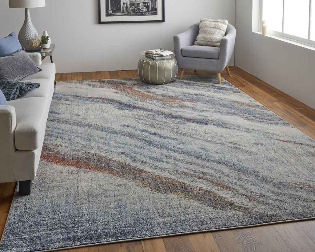 10' X 14' Ivory Orange And Blue Abstract Power Loom Stain Resistant Area Rug