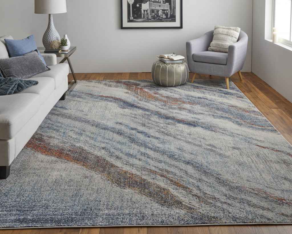 10' X 14' Ivory Orange And Blue Abstract Power Loom Stain Resistant Area Rug