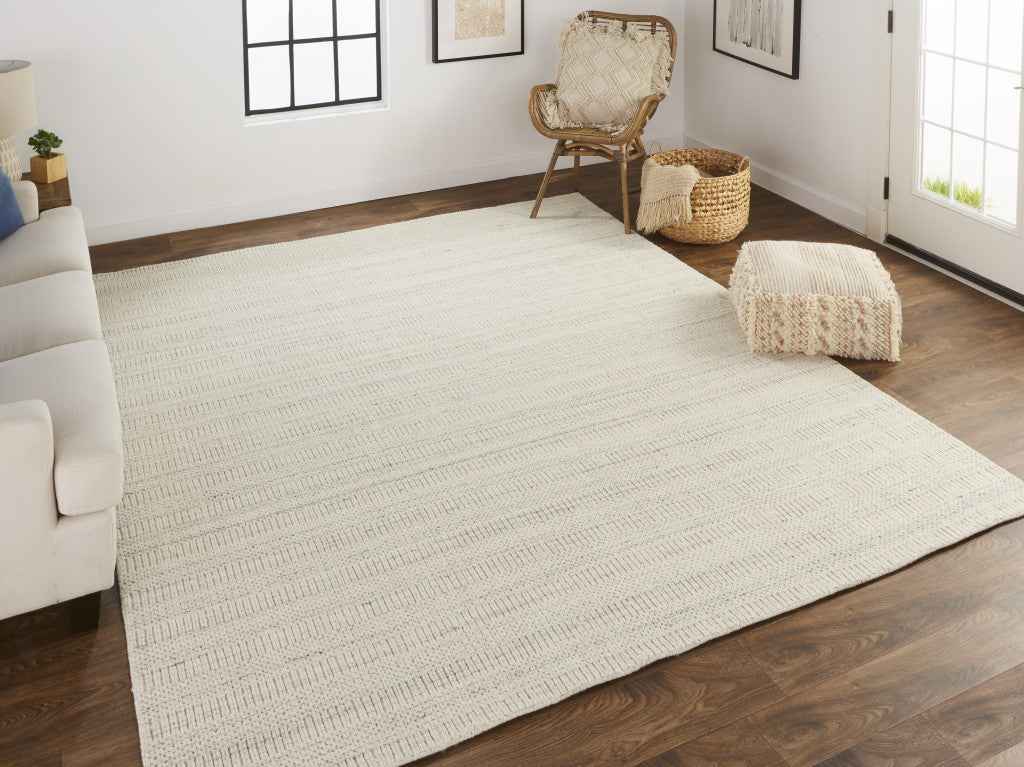 5' X 8' Ivory And Gray Wool Hand Woven Stain Resistant Area Rug