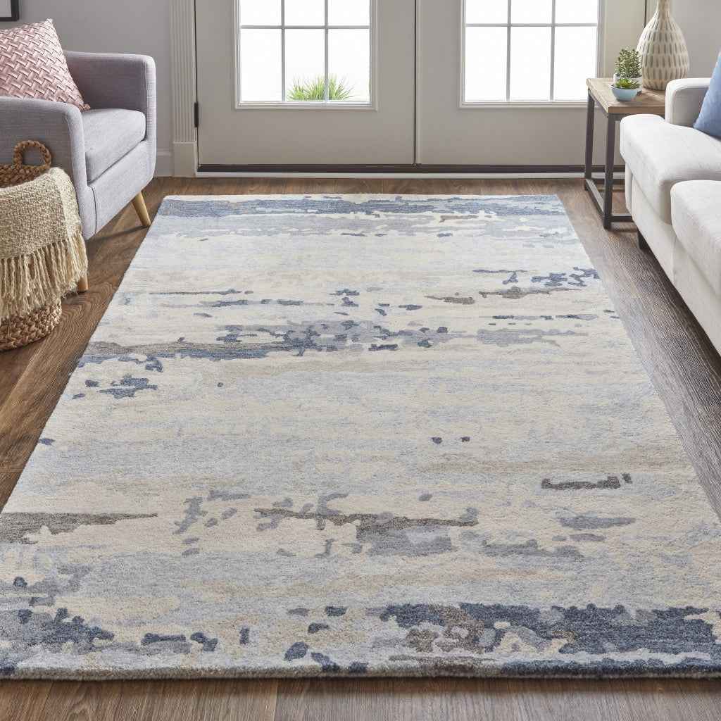 5' X 8' Blue Gray And Ivory Wool Abstract Tufted Handmade Stain Resistant Area Rug