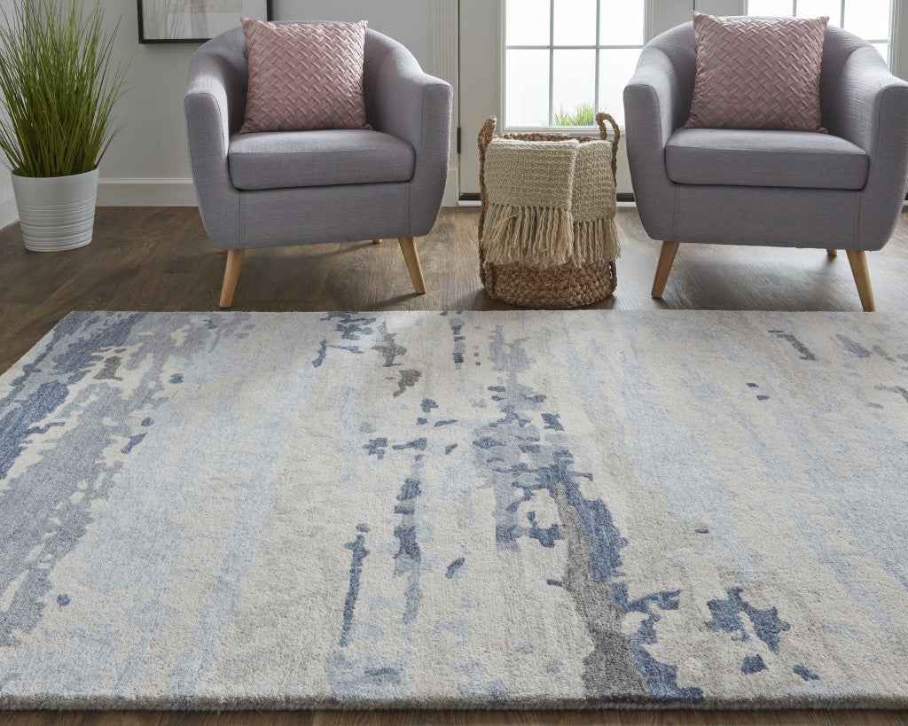 5' X 8' Blue Gray And Ivory Wool Abstract Tufted Handmade Stain Resistant Area Rug