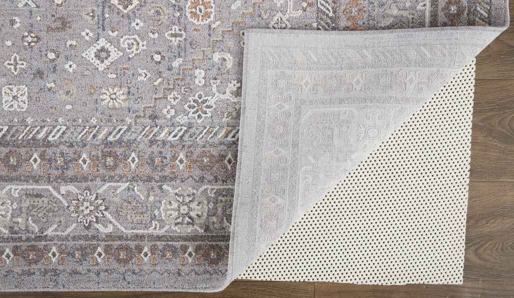 12' X 15' Gray Orange And Ivory Floral Power Loom Stain Resistant Area Rug