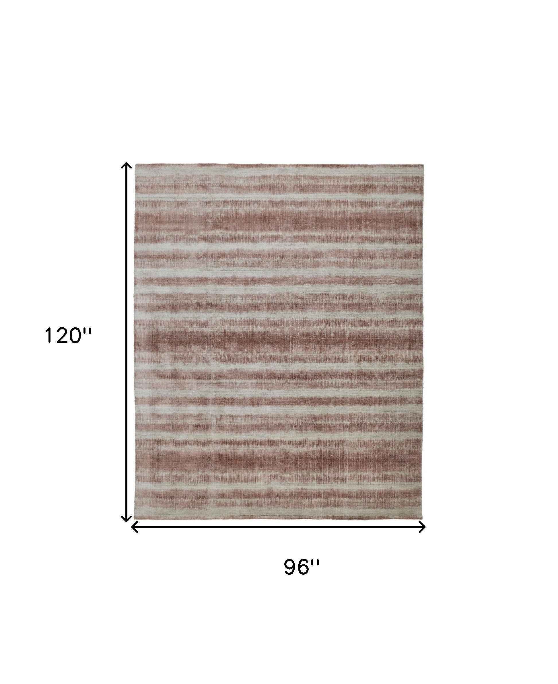 8' X 10' Tan Ivory And Pink Abstract Hand Woven Area Rug