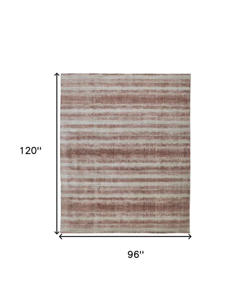 8' X 10' Tan Ivory And Pink Abstract Hand Woven Area Rug