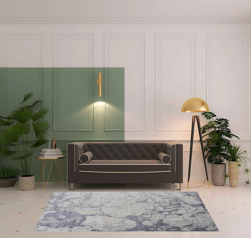 5' X 8' Ivory And Blue Abstract Power Loom Distressed Area Rug