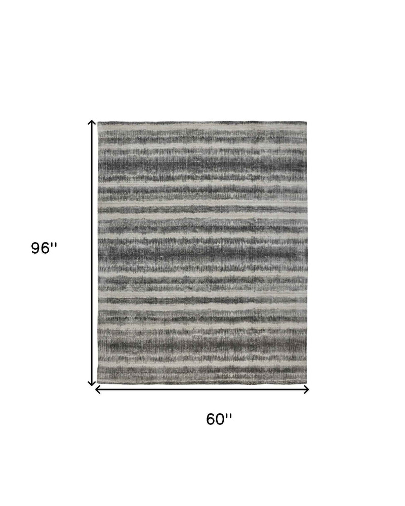 5' X 8' Gray Ivory And Black Abstract Hand Woven Area Rug