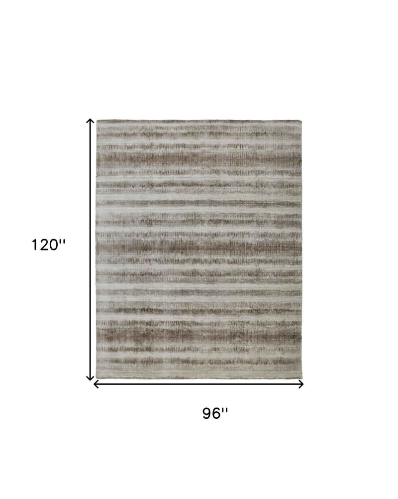 8' X 10' Tan Ivory And Brown Abstract Hand Woven Area Rug