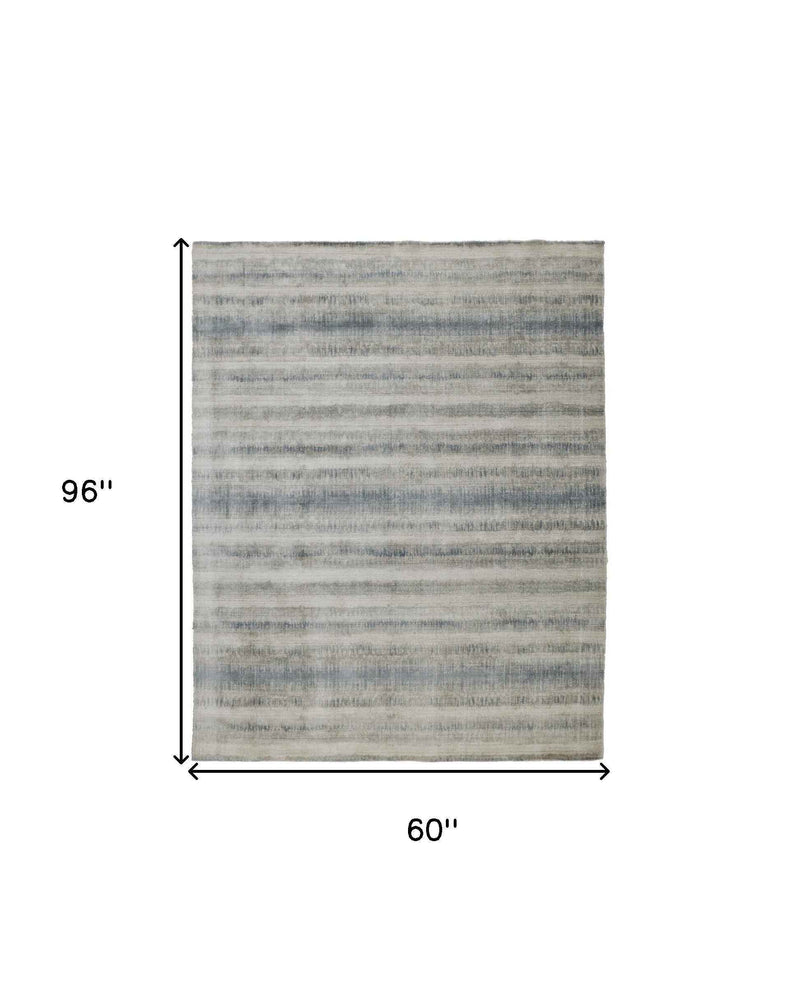 5' X 8' Gray Blue And Green Abstract Hand Woven Area Rug