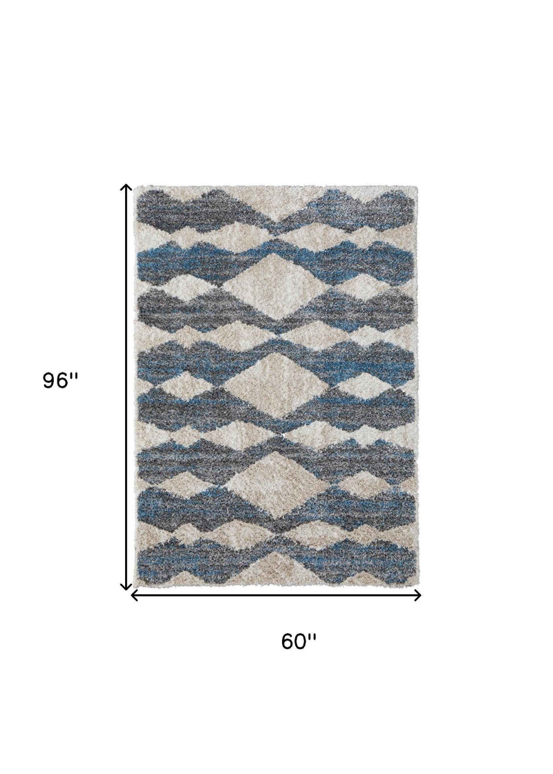 5' X 8' Ivory Gray And Blue Chevron Power Loom Stain Resistant Area Rug