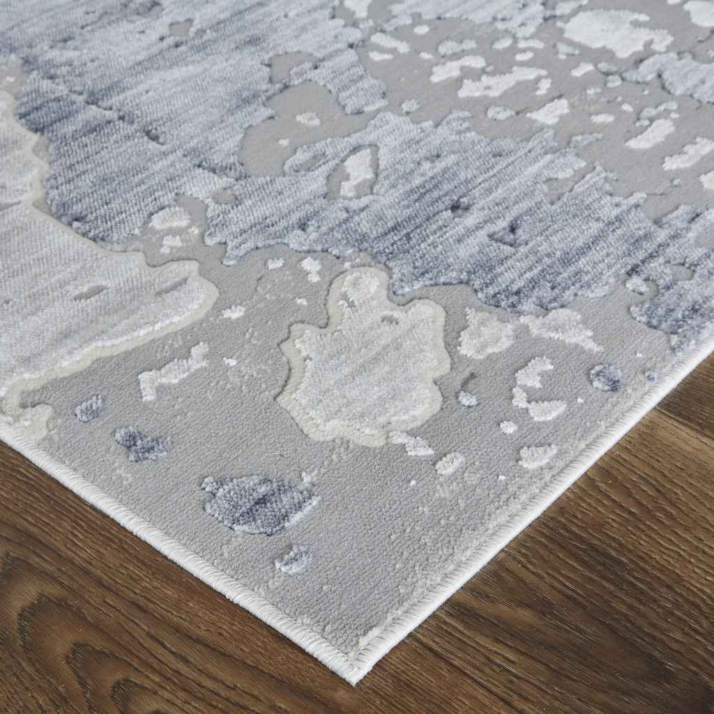 4' X 6' Ivory And Blue Abstract Power Loom Distressed Area Rug
