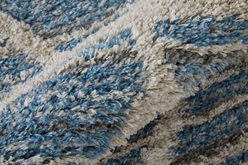 5' X 8' Blue And Ivory Geometric Power Loom Stain Resistant Area Rug