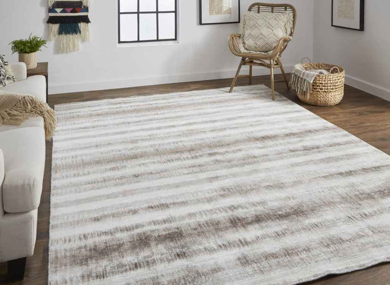 5' X 8' Tan Ivory And Brown Abstract Hand Woven Area Rug
