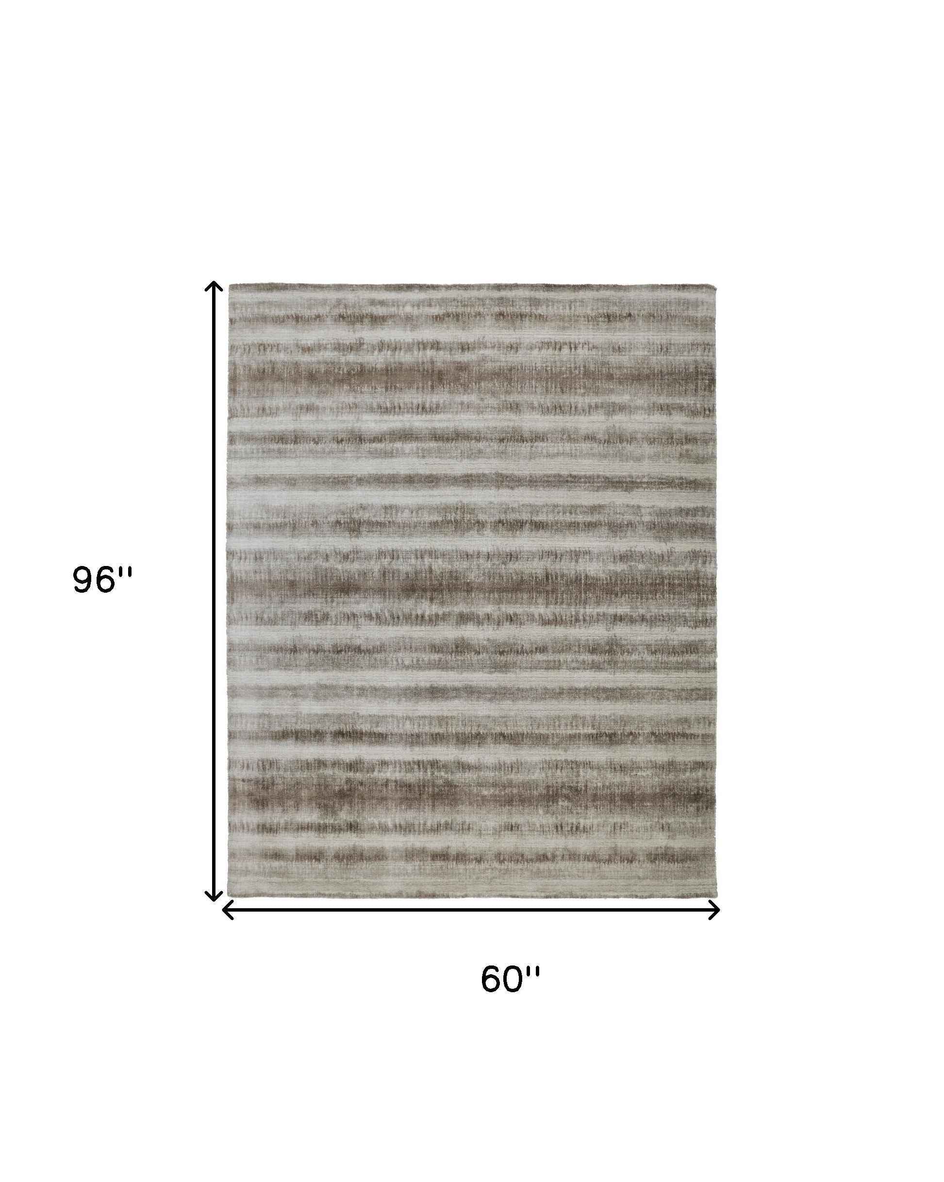 5' X 8' Tan Ivory And Brown Abstract Hand Woven Area Rug