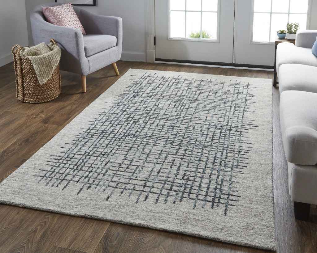 5' X 8' Gray Black And Tan Wool Plaid Tufted Handmade Stain Resistant Area Rug