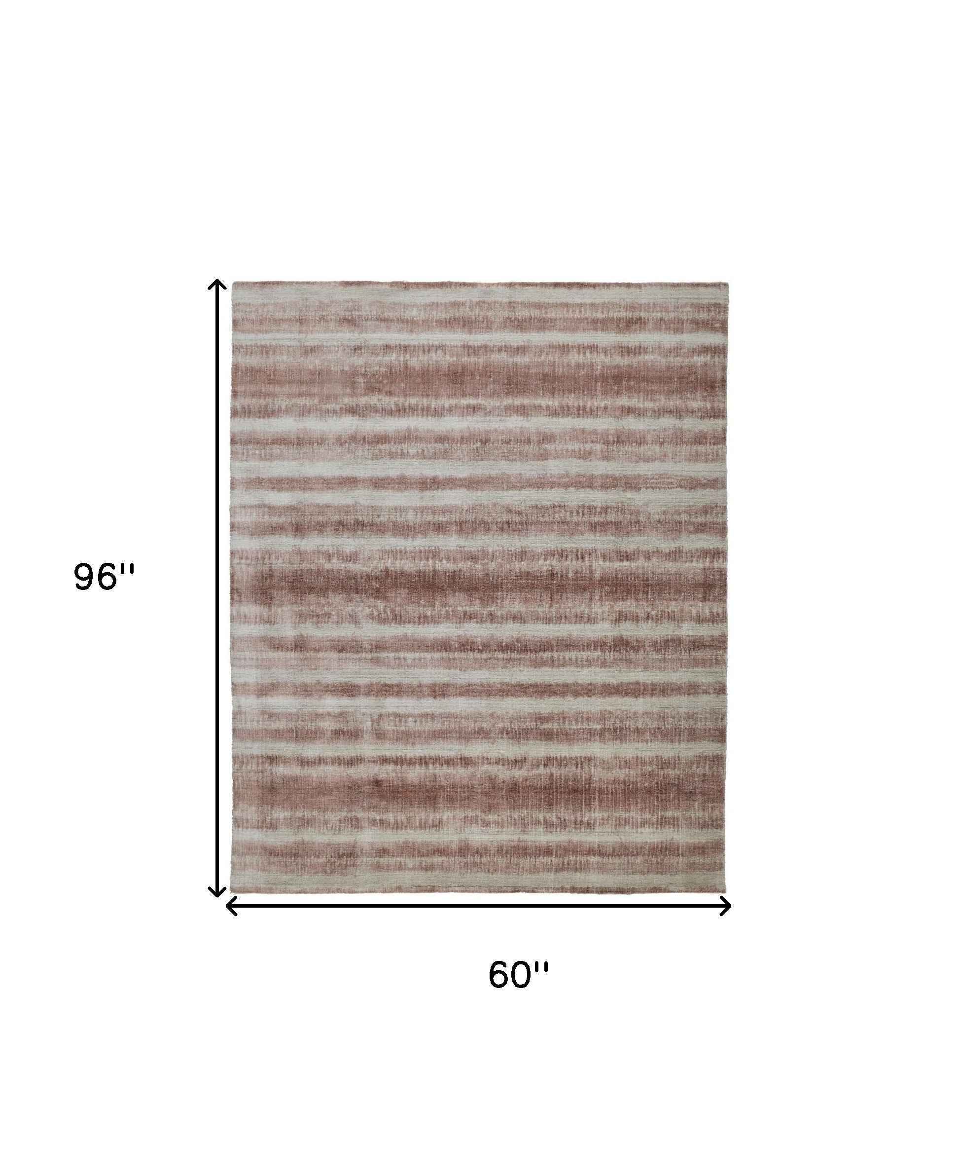 5' X 8' Tan Ivory And Pink Abstract Hand Woven Area Rug