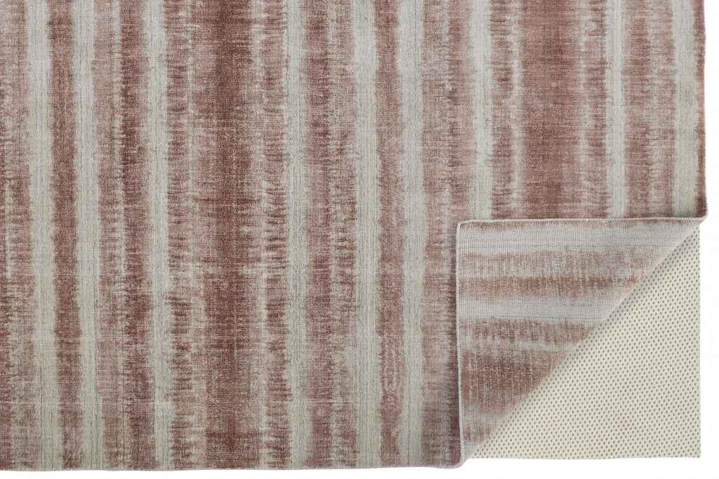 5' X 8' Tan Ivory And Pink Abstract Hand Woven Area Rug