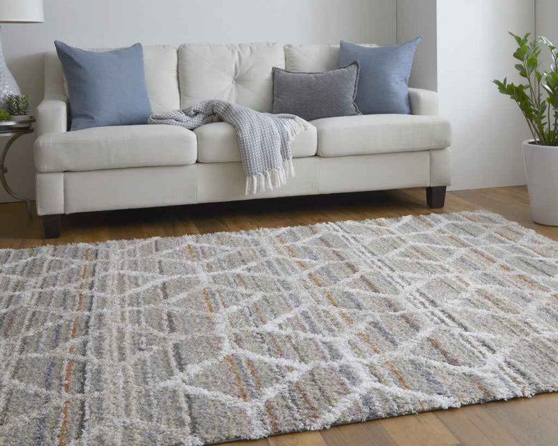 9' X 12' Tan Taupe And Ivory Geometric Power Loom Stain Resistant Area Rug