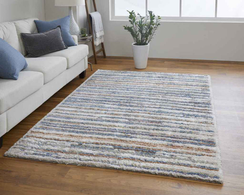 10' X 14' Ivory Blue And Orange Striped Power Loom Stain Resistant Area Rug
