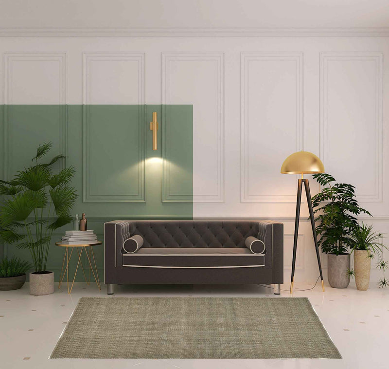 5' X 8' Green And Tan Hand Woven Area Rug