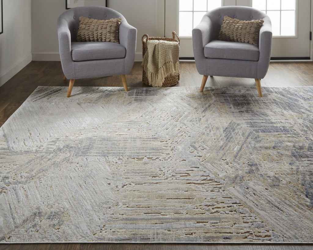 8' X 10' Tan Ivory And Gray Abstract Power Loom Distressed Area Rug