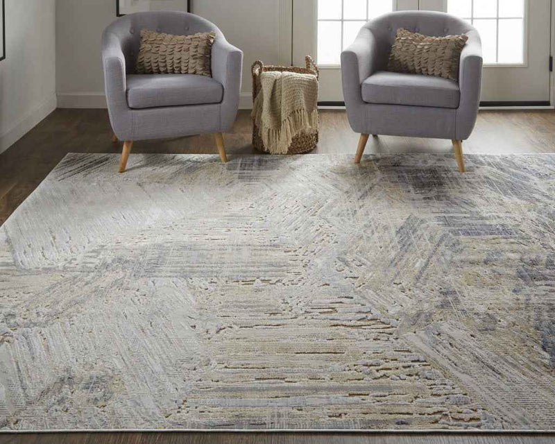 8' X 10' Tan Ivory And Gray Abstract Power Loom Distressed Area Rug
