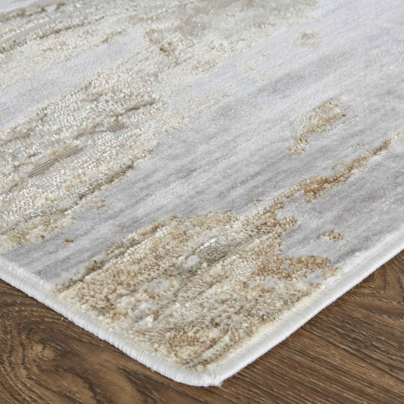 5' X 8' Tan And Ivory Abstract Power Loom Distressed Area Rug