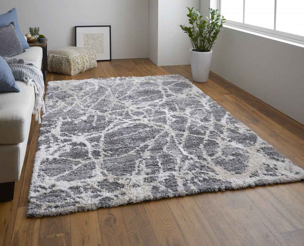 5' X 8' Gray And Ivory Abstract Power Loom Stain Resistant Area Rug