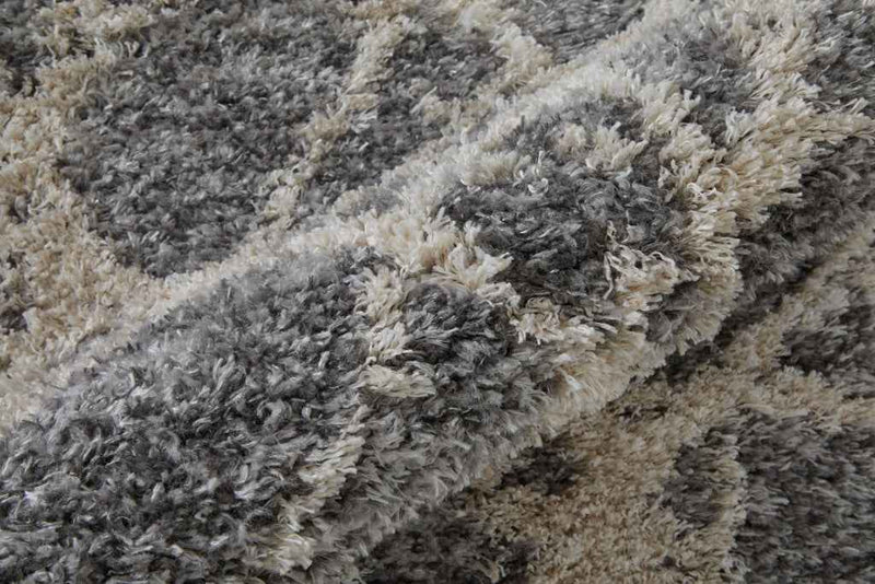 5' X 8' Gray And Ivory Abstract Power Loom Stain Resistant Area Rug